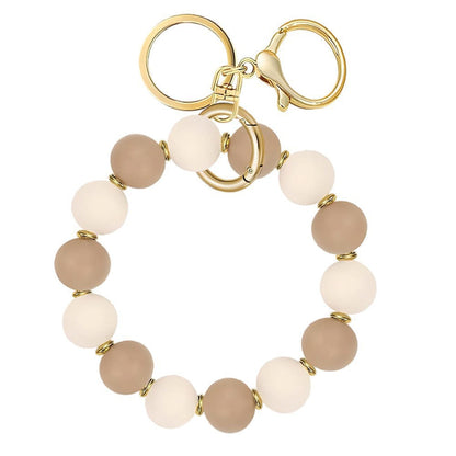 Llavero con borla de PU para bolso de mujer, llavero de silicona con cuentas, pulsera, llavero de coche, bonito soporte para mujeres y niñas. 