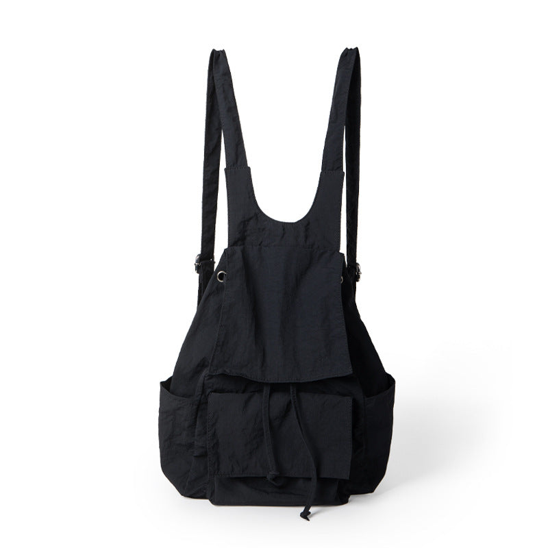 Mochila ligera de nailon para mujer, con múltiples bolsillos y diseño plisado, color beige. 