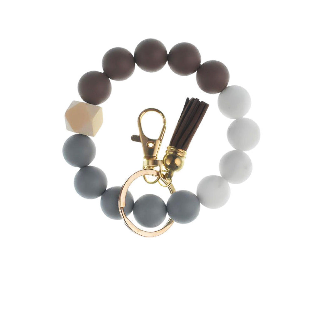 Llavero con borla de PU y cuentas de silicona para bolso, pulsera, llavero de coche, para mujeres y niñas 