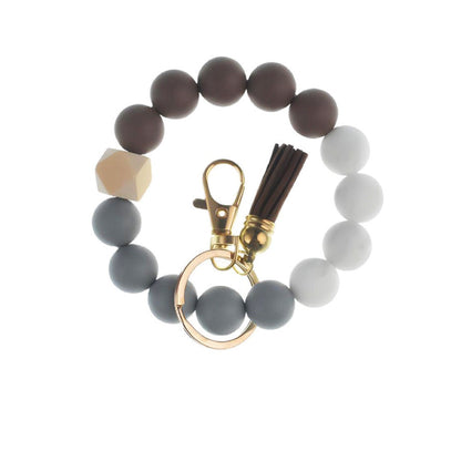Llavero con borla de PU y cuentas de silicona para bolso, pulsera, llavero de coche, para mujeres y niñas 