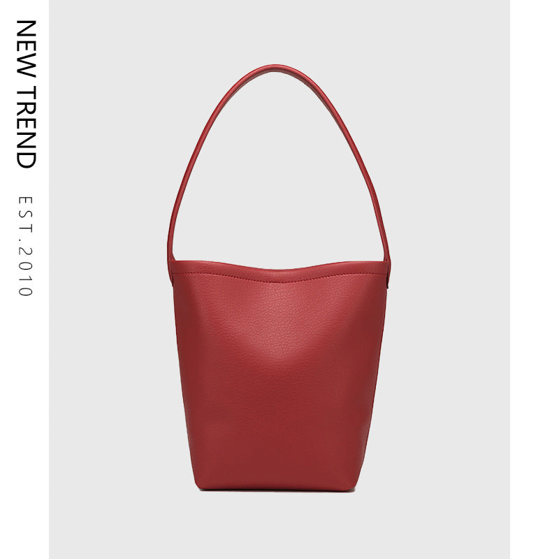 Bolso de mano versátil de diseño, bolso hobo, bolso tipo cubo texturizado para mujer 