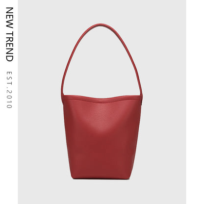 Bolso de mano versátil de diseño, bolso hobo, bolso tipo cubo texturizado para mujer 