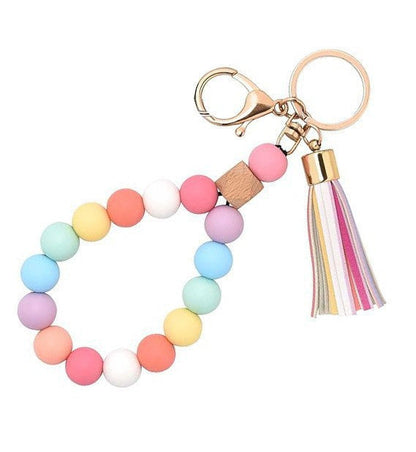 Llavero con borla de PU para bolso de mujer, llavero de silicona con cuentas, pulsera, llavero de coche, bonito soporte para mujeres y niñas. 