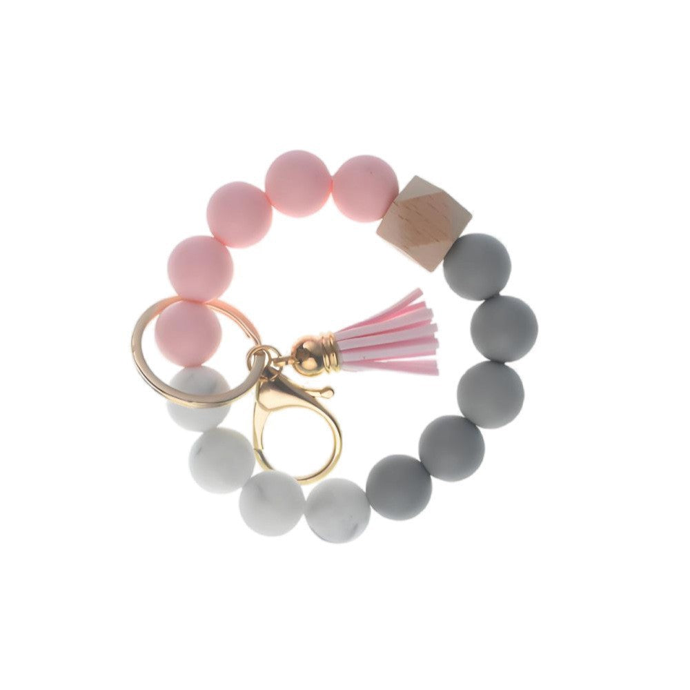 Llavero con borla de PU y cuentas de silicona para bolso, pulsera, llavero de coche, para mujeres y niñas 