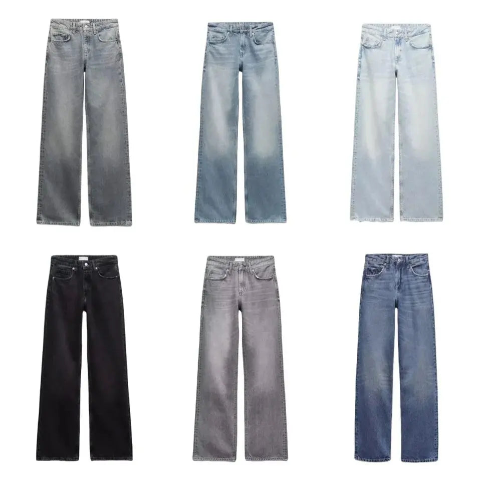 Collection of six pairs of jeans in various shades on a white background