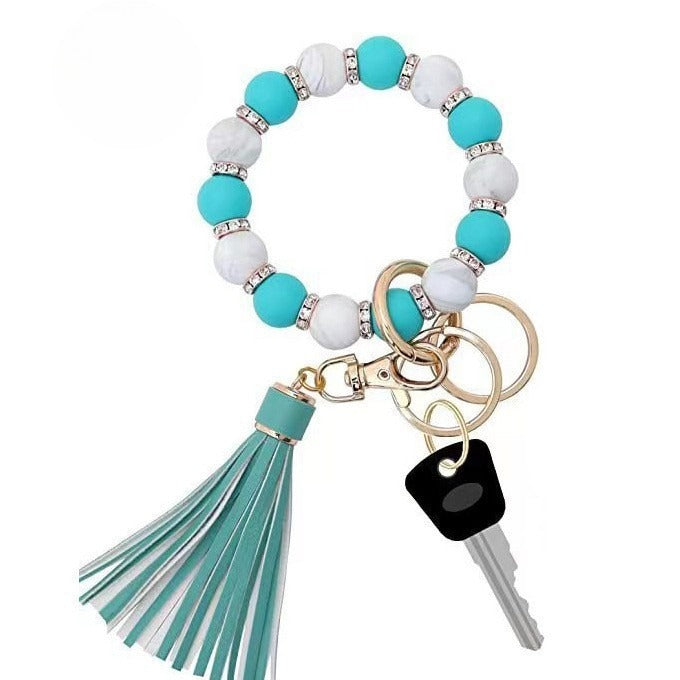 Llavero con borla de PU para bolso de mujer, llavero de silicona con cuentas, pulsera, llavero de coche, bonito soporte para mujeres y niñas. 