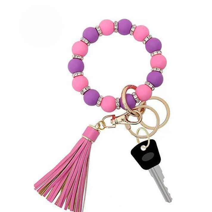 Llavero con borla de PU para bolso de mujer, llavero de silicona con cuentas, pulsera, llavero de coche, bonito soporte para mujeres y niñas. 