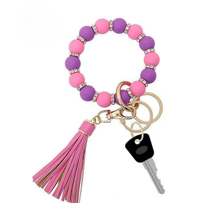 Llavero con borla de PU para bolso de mujer, llavero de silicona con cuentas, pulsera, llavero de coche, bonito soporte para mujeres y niñas. 