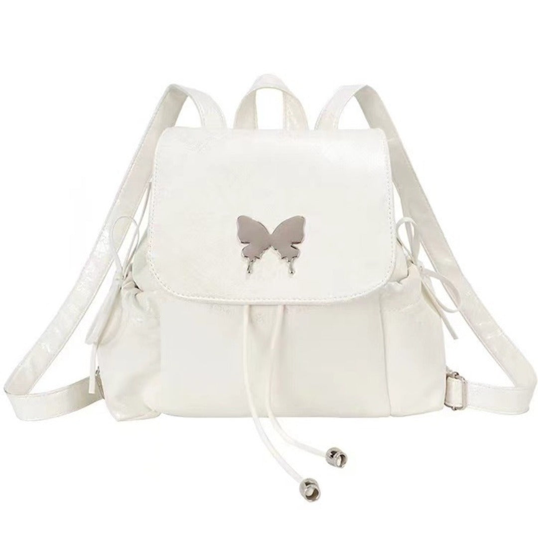 Mochila blanca con mariposas, elegante y práctica. Ideal para estudiantes y como bolso de hombro o mochila de viaje. 