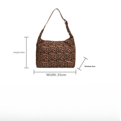 Bolso hobo de gran capacidad con estampado de leopardo, bolso tote para mujer, bolso de hombro versátil y a la moda, bolso de lona para el día a día. 