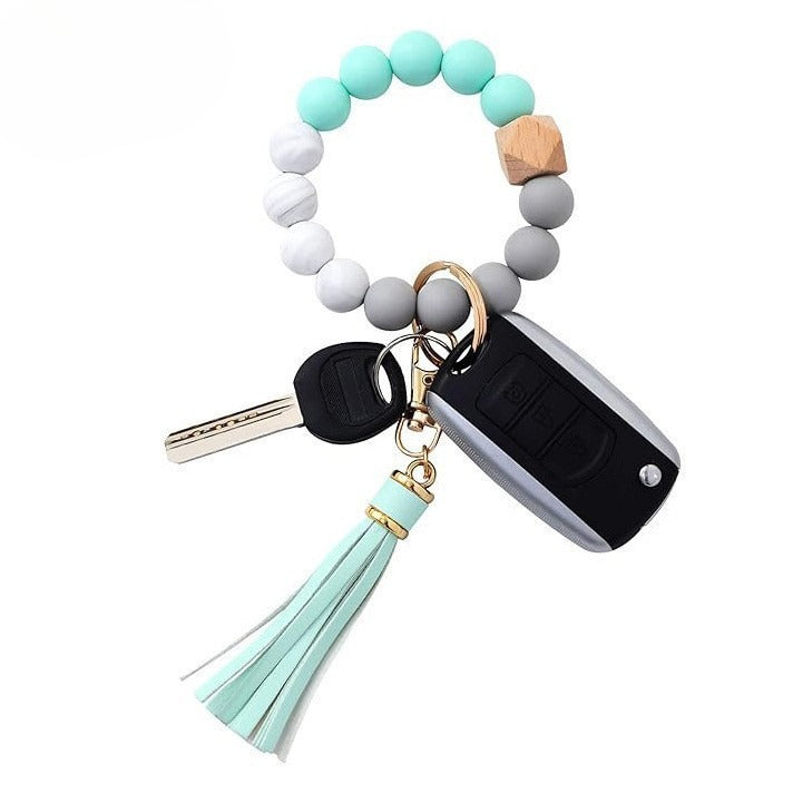 Llavero con borla de PU y cuentas de silicona para bolso, pulsera, llavero de coche, para mujeres y niñas 
