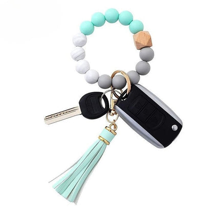 Llavero con borla de PU y cuentas de silicona para bolso, pulsera, llavero de coche, para mujeres y niñas 