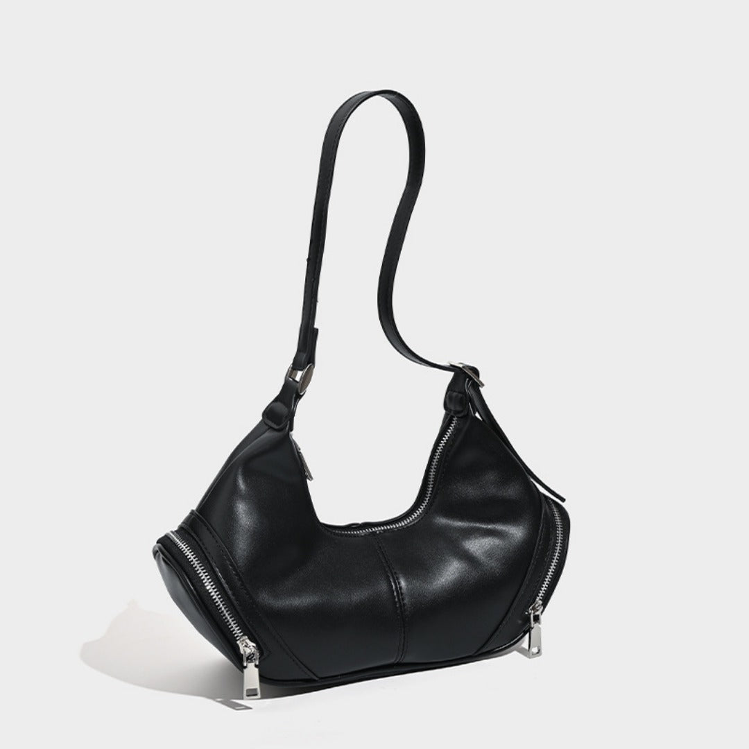 Bolso bandolera estilo hobo, elegante y vintage, con bolsillo con cremallera. También disponible en versión de hombro o bajo el brazo. 