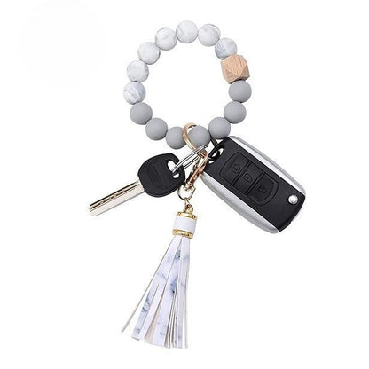 Llavero con borla de PU y cuentas de silicona para bolso, pulsera, llavero de coche, para mujeres y niñas 