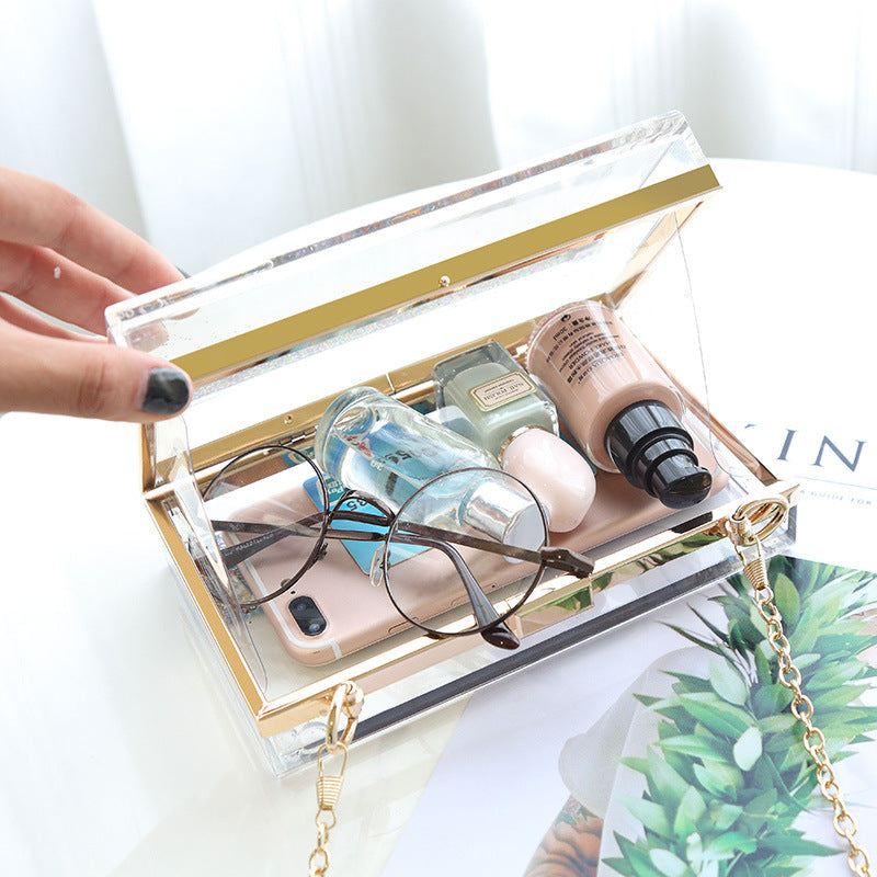 Bolso de mano tipo clutch con cadena y lentejuelas transparentes para mujer, ideal para fiestas y eventos.