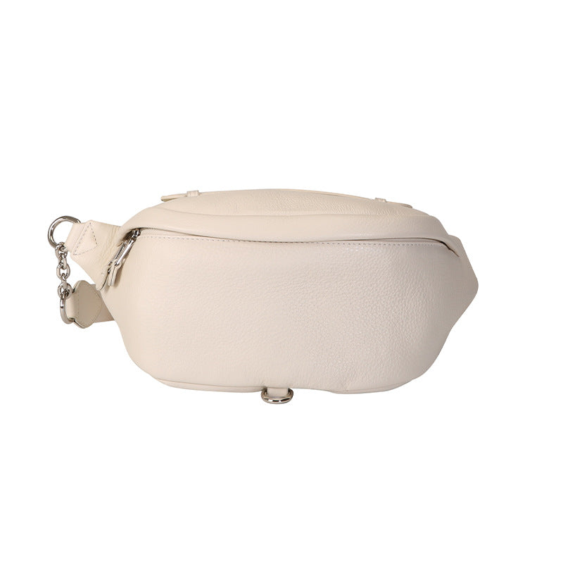 Riñonera de piel auténtica para mujer, elegante bandolera unisex para viajes y running.